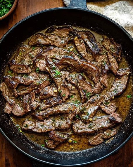 Pan-Seared Flank Steak with Garlic Herb Butter delights all!