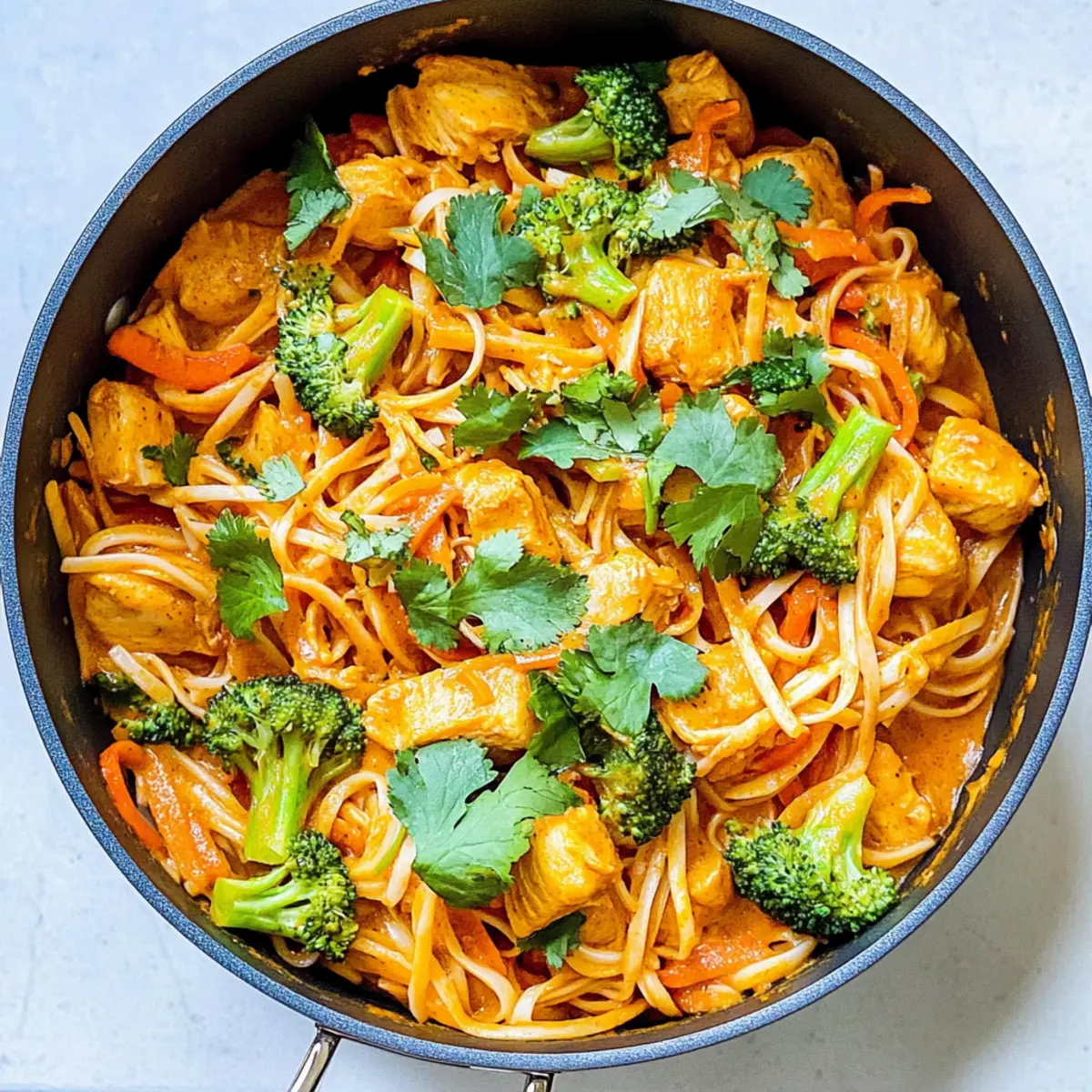 Creamy Coconut Curry Chicken with Flavor-Packed Rice Noodles