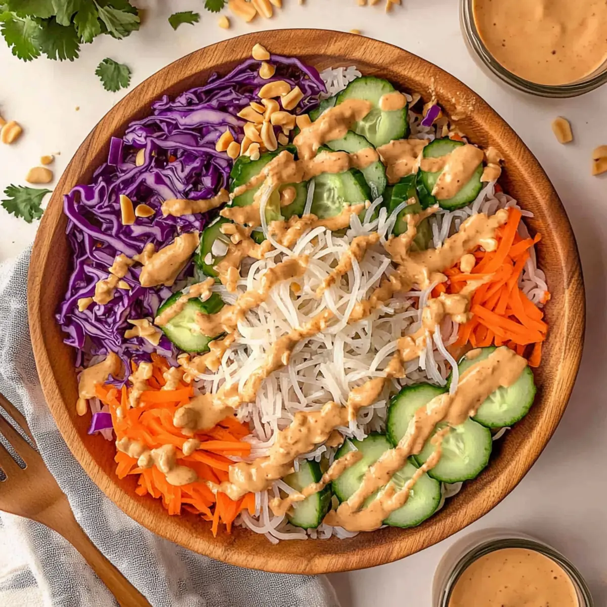 Vibrant Spring Roll Salad with Rich Peanut Sauce Delight